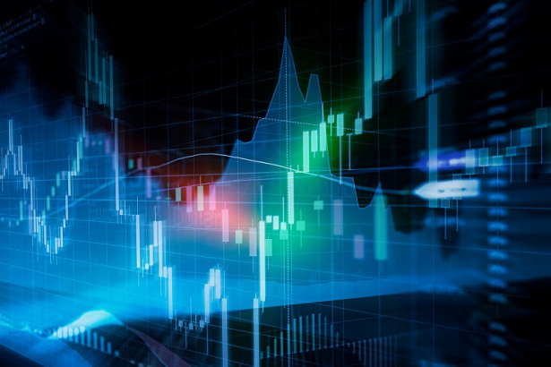 Candle stick graph and bar chart of stock market investment trading.