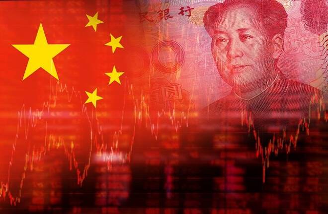 Chinese Yuan Falls After Moody’s Downgrade