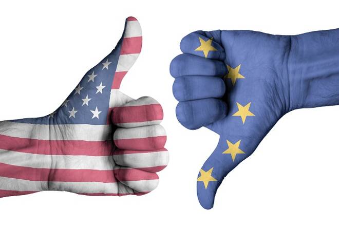 Europe and USA flag on human male hands