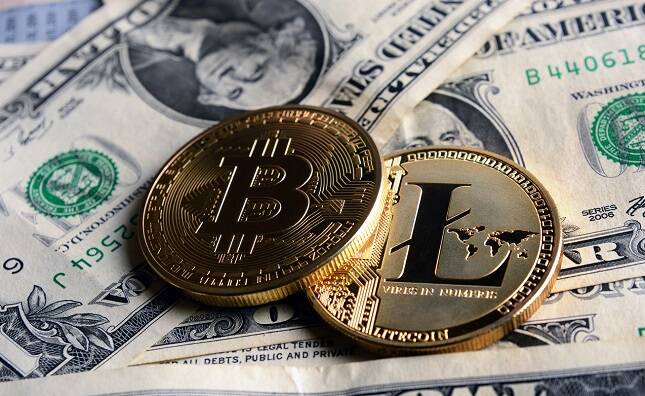 Bitcoin and Litecoin over dollar banknotes.