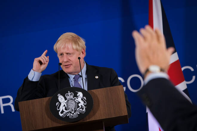 Britain's Prime Minister Boris Johnson addresses a press conference during an European Union Summit at European Union Headquarters in Brussels, Belgium on Oct. 17, 2019.