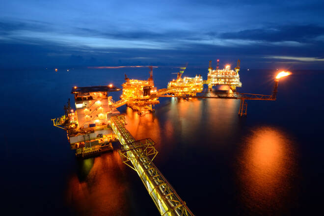 The large offshore oil rig at night