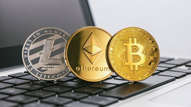 Aachen, Germany -September15, 2017: virtual Cryptocurrencys Ethereum, Bitcoin, Litecoin on a notebook, bitcoin Hype concept image. ideal for websites and magazines layouts