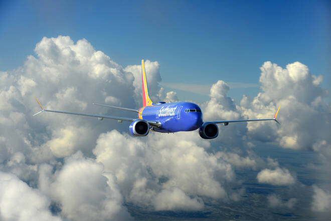 Southwest Airlines Boeing 737_800 MAX in flight with beautiful clouds as background