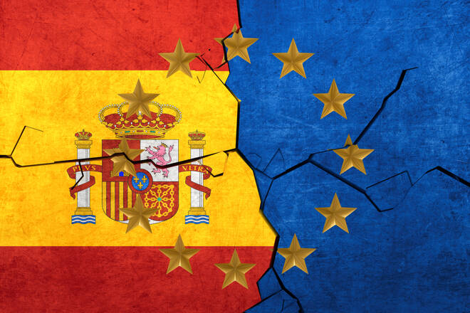 European union and Spainish flags breaking apart