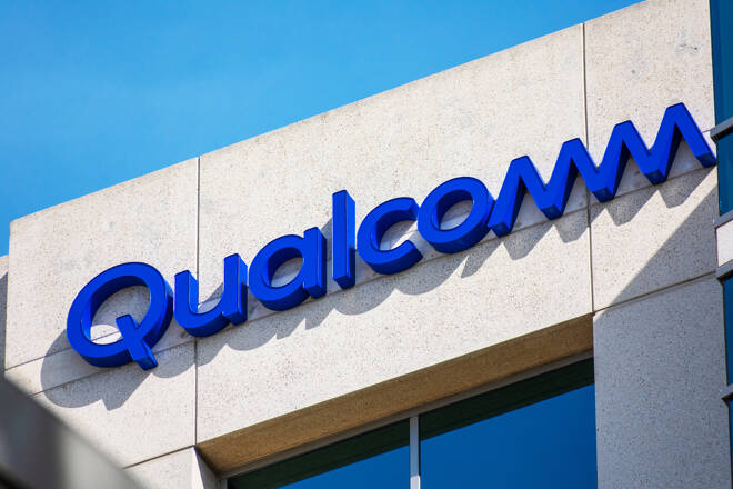 Close up. Qualcomm logo atop company office. Qualcomm Incorporated is an American multinational semiconductor and telecommunications equipment company