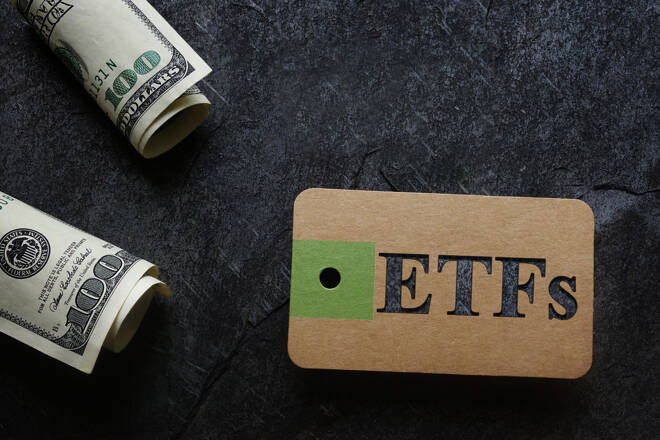 ETF (Exchange Traded Fund ) tag with cash and dark background