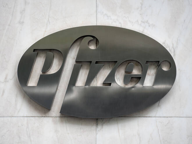 NEW YORK CITY - MAY 2015: Metal plate logo of Pfizer in his head