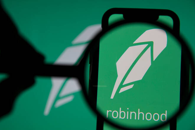 Robinhood investing app under magnifying glass
