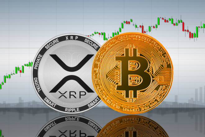 Bitcoin (BTC) and XRP coins on the background of the chart; bitcoin and xrp cryptocurrency; crypto exchange