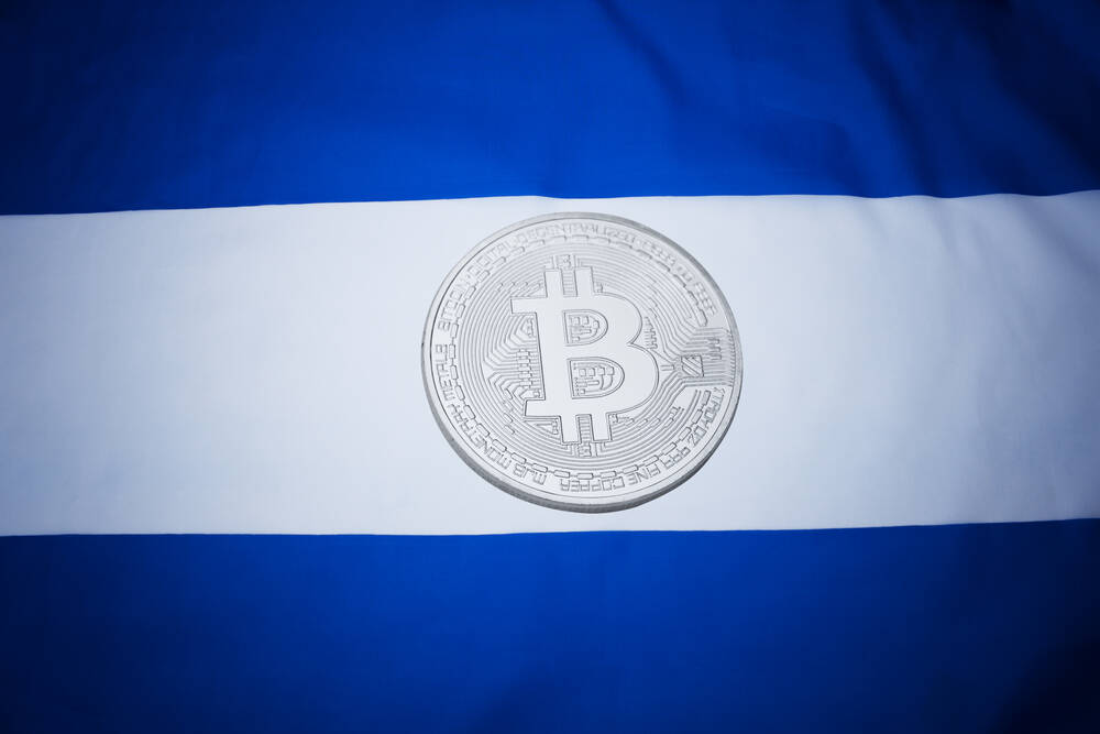 El Salvador flag with bitcoin. Bitcoin law concept.