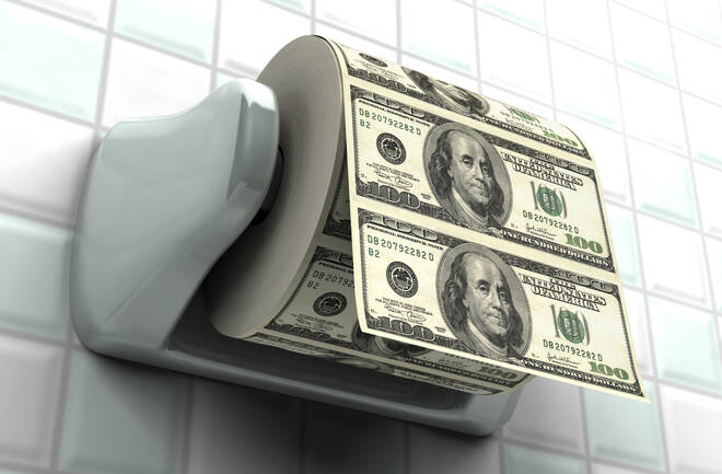 Monetary Inflation -Roll of $100 bills on a toilet paper spindle