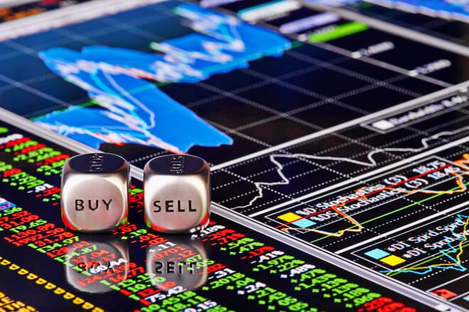 Dices cubes to trader. Cubes with the words SELL BUY on financia fxempire
