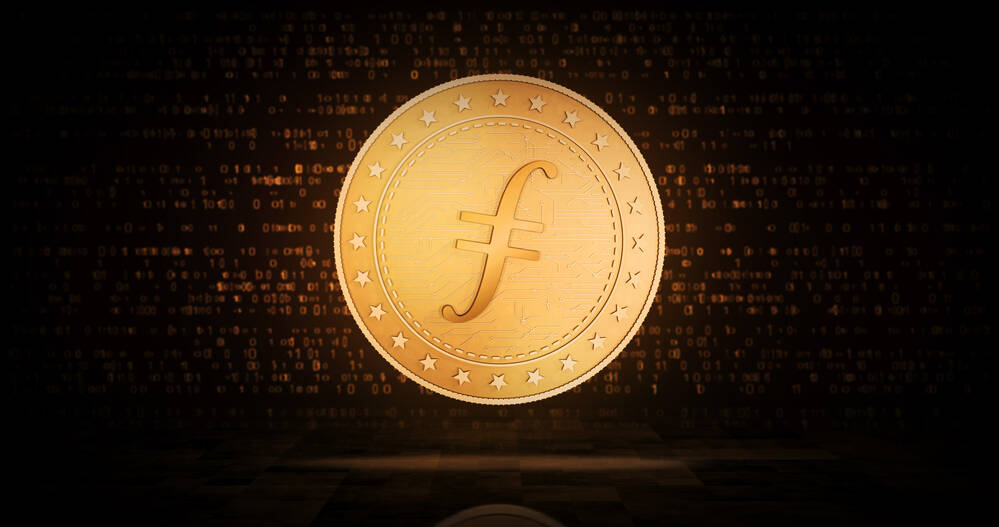 Filecoin FIL cryptocurrency symbol golden coin illustration fxempire