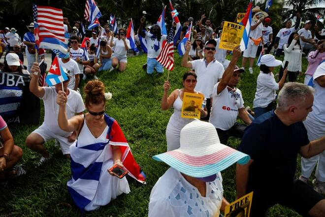 People attend a rally ahead of an opposition demonstration in Cuba