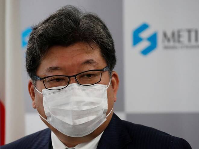 Japan's new Economy, Trade and Industry Minister Koichi Hagiuda wearing a protective mask amid the coronavirus disease (COVID-19) outbreak, speaks at a news conference in Tokyo