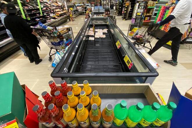 Customers browse grocery store shelves inside Kroger Co.'s Ralphs supermarket amid fears of the global growth of coronavirus cases, in Los Angeles