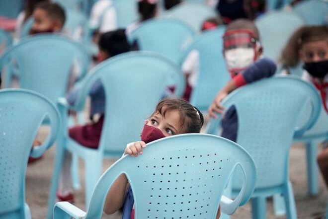 Children take part in the opening ceremony of the new school year for primary school students, in Havana