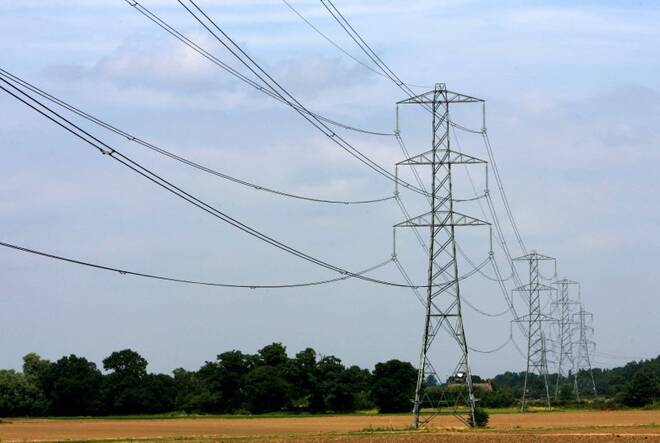 Electricity pylons are pictured near Cobham in Surrey, southern England