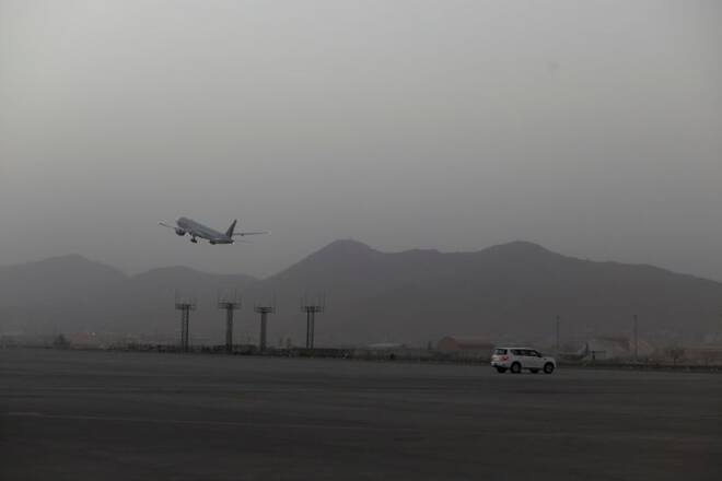 A Qatar Airways flight takes off from the international airport in Kabul