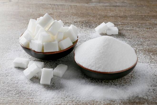 Granulated sugar and sugar cubes are seen in this picture illustration