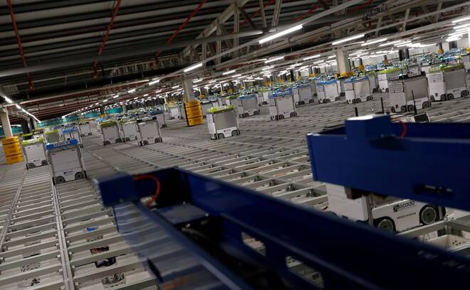 "Bots" are seen on the grid of the "smart platform" at the Ocado CFC (Customer Fulfilment Centre) in Andover