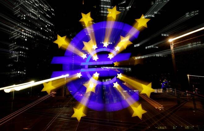 The euro sign is photographed in front of the former headquarters of the European Central Bank in Frankfurt