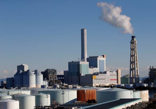 Chimneys are pictured in an industrial area in Yokohama