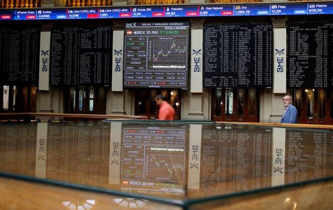 Electronic boards are seen at Madrid stock exchange which plummeted after Britain voted to leave European Union in EU BREXIT referendum, in Madrid