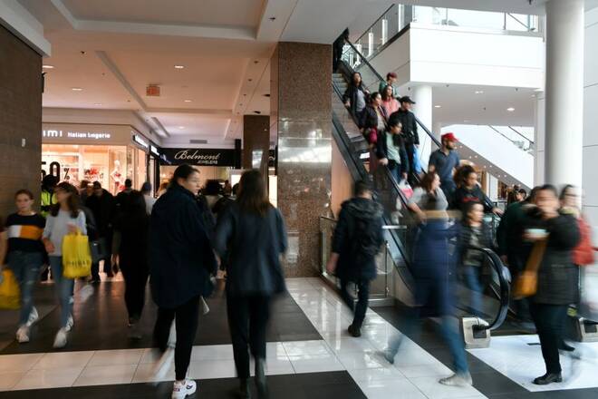 Holiday shoppers look for deals at the Pentagon City Mall in Arlington