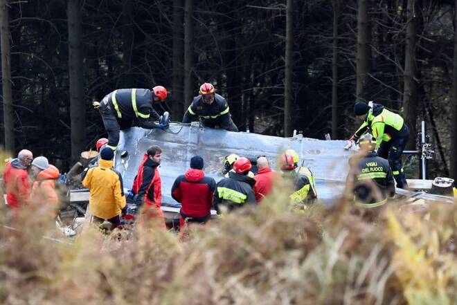 Italian fire brigade works to remove crashed cable car cabin, which left 14 people dead, after it collapsed on May 23, 2021,