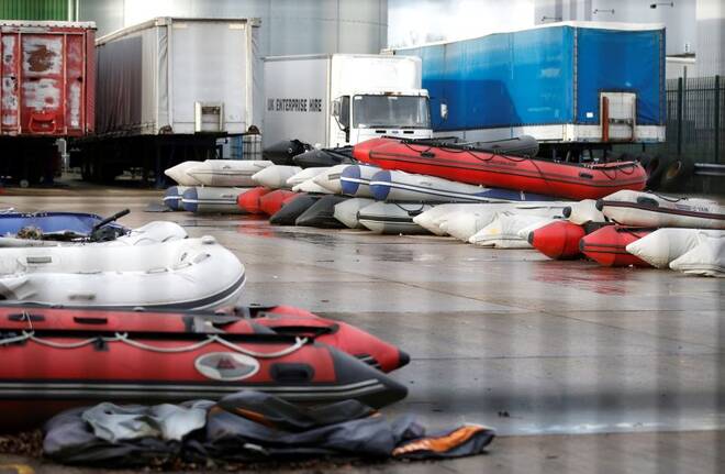 Inflatable boats, believed to have been used by migrants that crossed the English Channel from France, are stored in a secure facility near Dover