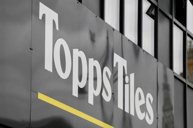 Signage is seen outside a branch of Topps Tiles, London, Britain