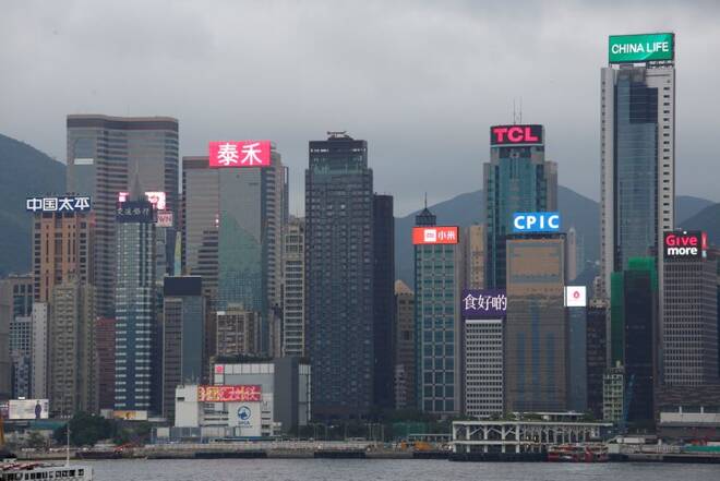 Neon signs illuminate Chinese listed companies in Hong Kong