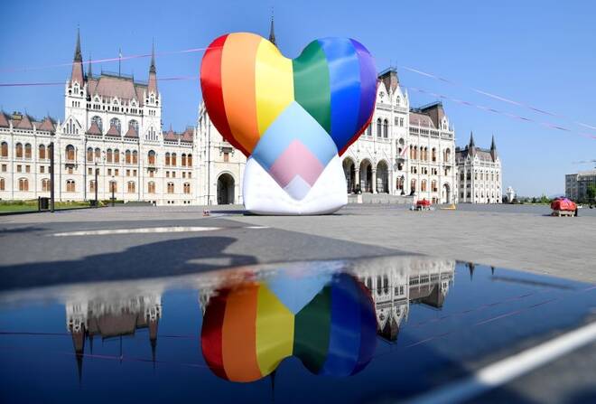 NGOs fly huge rainbow balloon at Hungary's parliament protesting against anti-LGBT law in Budapest