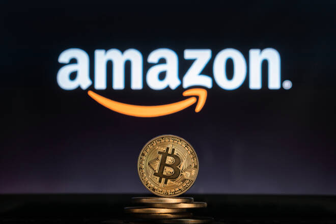 Bitcoin,On,A,Stack,Of,Coins,With,Amazon,Logo,On