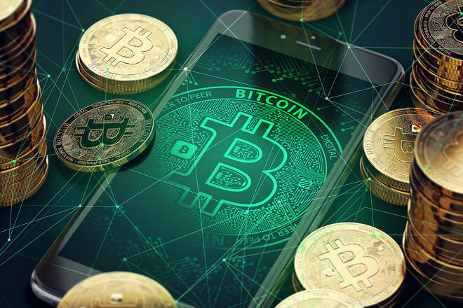 Smartphone,With,Bitcoin,Symbol,On-screen,Among,Piles,Of,Golden,Bitcoins.