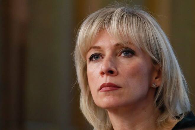 Russia's Foreign Ministry spokeswoman Zakharova listens during the annual news conference in Moscow