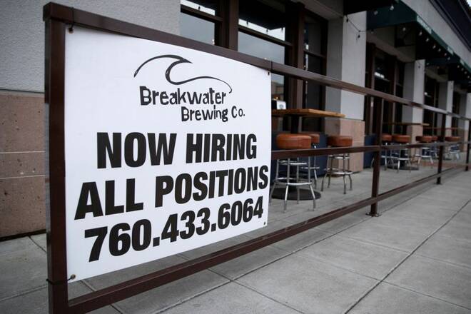 A restaurant advertising jobs looks to attract workers in Oceanside, California