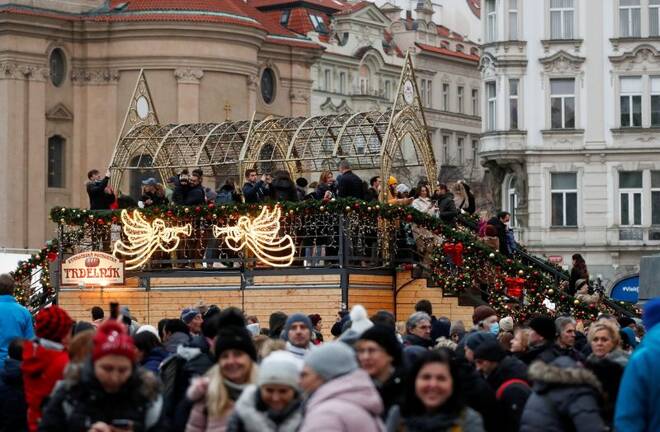 People visit closed Christmas market in Prague