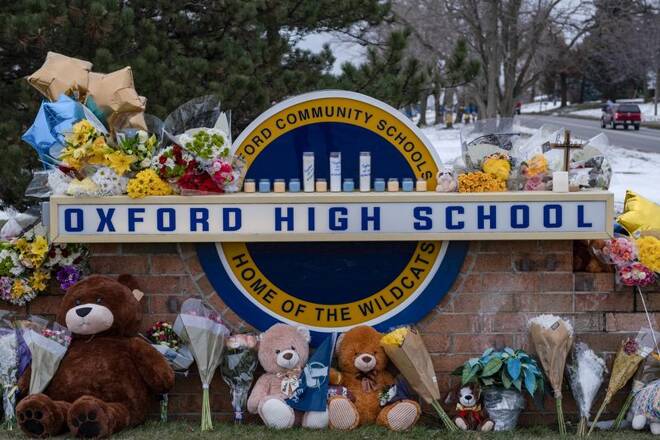 A memorial is seen at Oxford High school, a day after a shooting that left four dead and eight injured