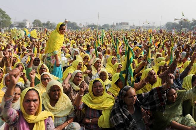 Farmers gather to mark the first anniversary of their protests on the outskirts of Delhi at Pakora Chowk near Tikri border