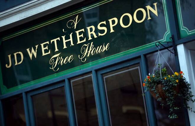 A Wetherspoon's logo is seen at a pub in central London