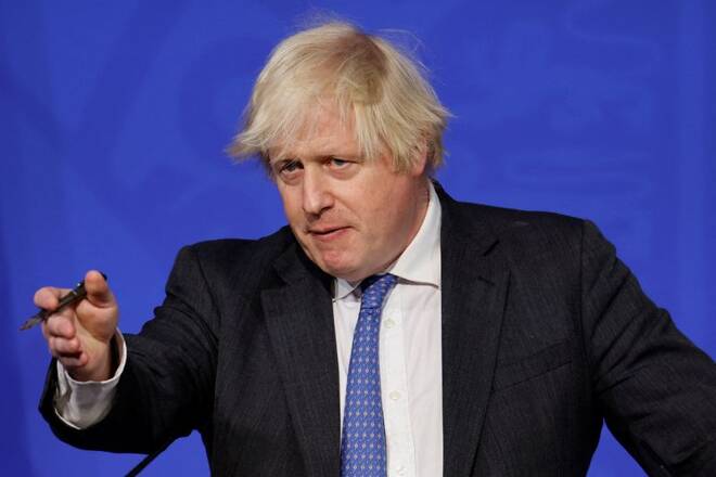 Britain's Prime Minister Boris Johnson attends a news conference in London