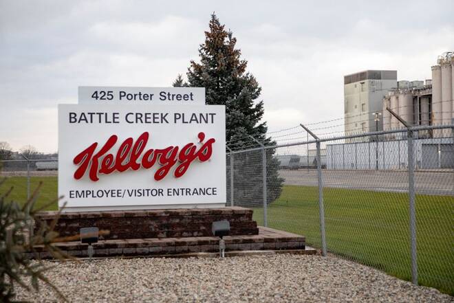 Striking Kellogg workers picket outside a plant in Michigan
