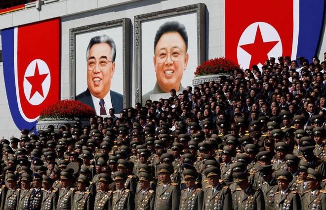 North Korean senior military officials watch a parade