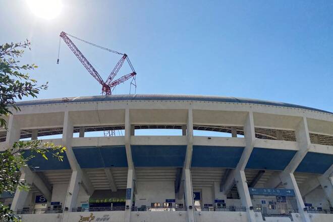 Crane stands at the renovation site of Shenzhen Stadium
