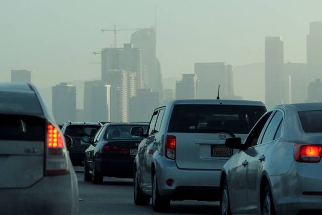 Commuters navigate early morning traffic as they drive towards downtown in Los Angeles, California