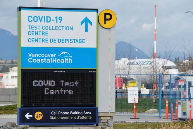 A sign for the COVID-19 test collection centre at the Vancouver International Airport