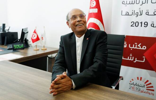 Former Tunisian President Moncef Marzouki submits his candidacy for the presidential election in Tunis